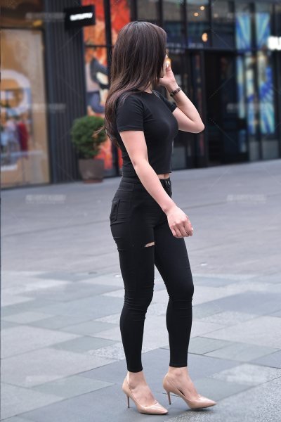 Black tight top with black ripped jeans