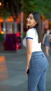White short sleeves and Blue high waisted jeans