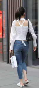 White top with slim jeans