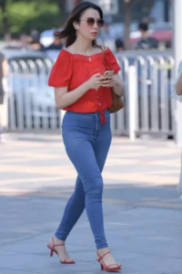 Red shoulder T-shirt with slim jeans