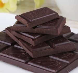 How many grams of 99% dark chocolate is recommended per day