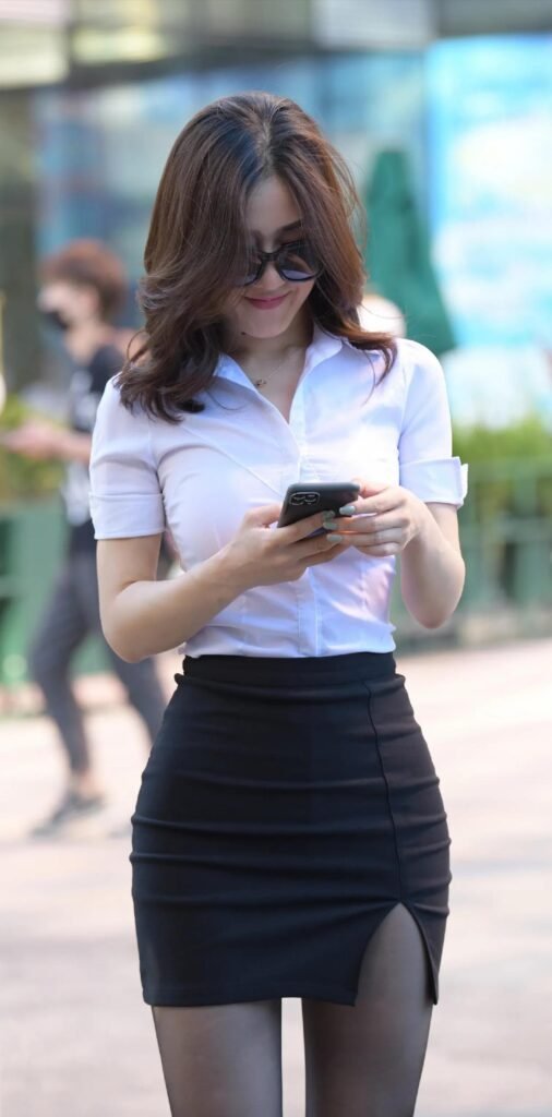 White half sleeve shirt with black mini skirt 