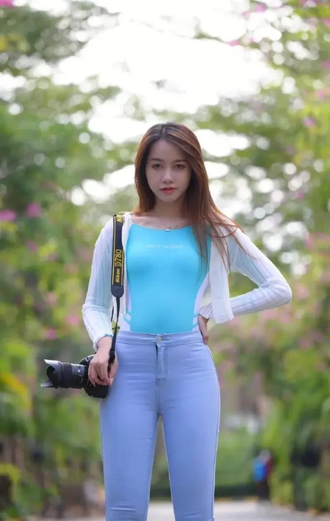Sky blue full sleeve tight T-shirt with light blue tight jeans